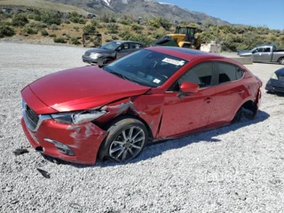 MAZDA 3 GRAND TO GRAND TOURING