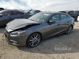 MAZDA 3 GRAND TO GRAND TOURING