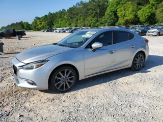 MAZDA 3 GRAND TO GRAND TOURING