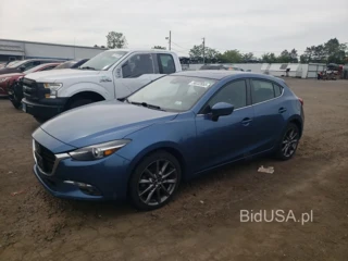 MAZDA 3 GRAND TO GRAND TOURING