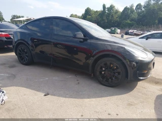 TESLA TESLA MODEL Y STANDARD RANGE REAR-WHEEL DRIVE