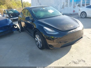 TESLA TESLA MODEL Y STANDARD RANGE REAR-WHEEL DRIVE
